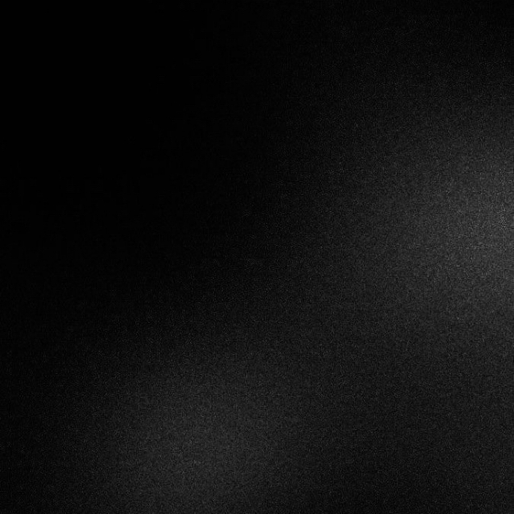 Deep black studio backdrop used on The Rapid service card